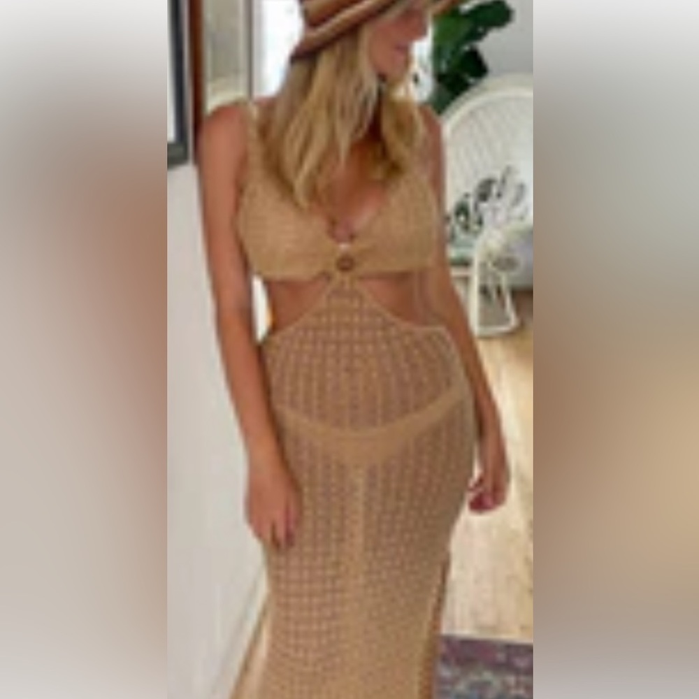 Soft crochet cover up dress. Size large but runs small.